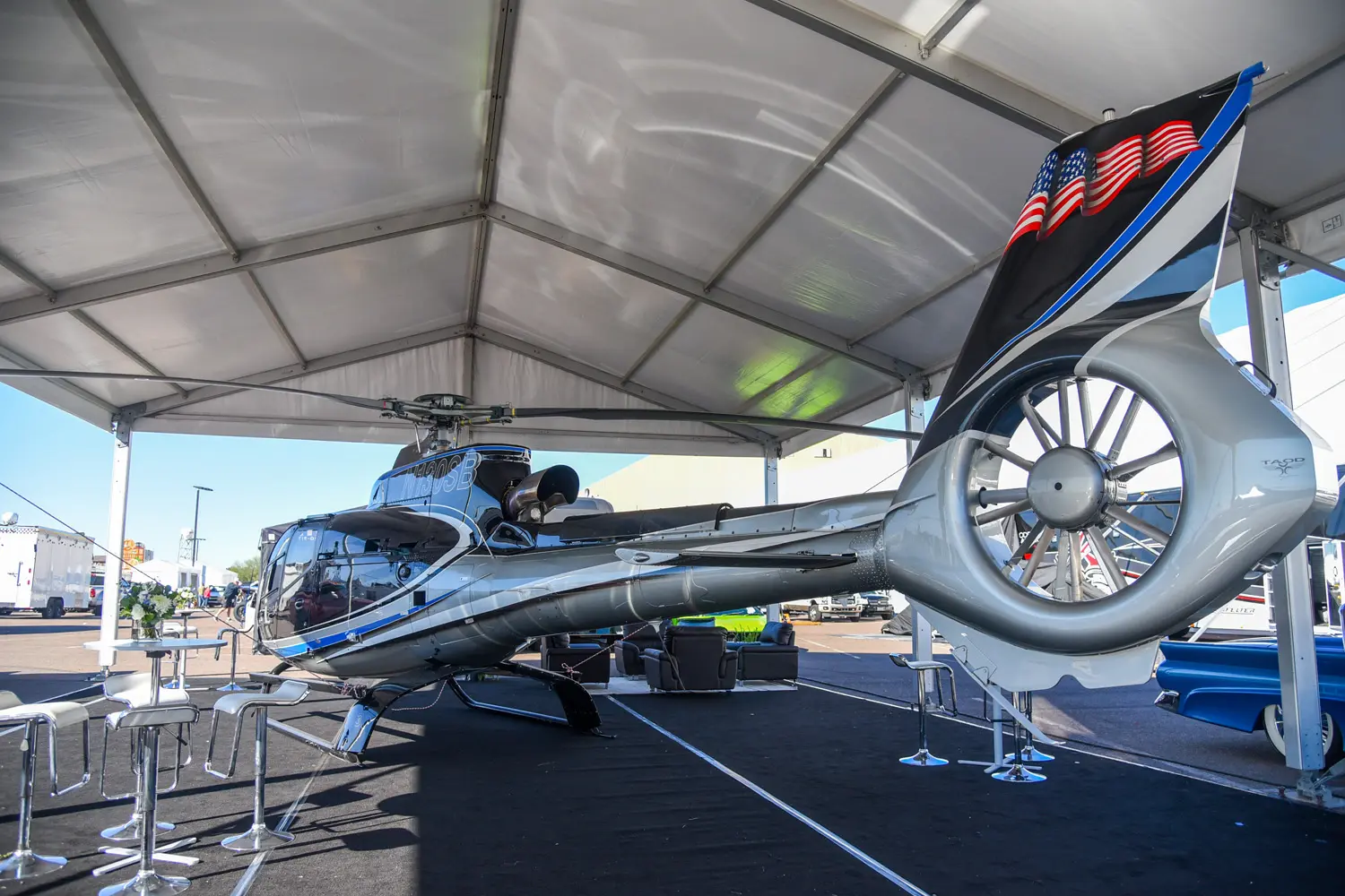 Helicopter inside a tent