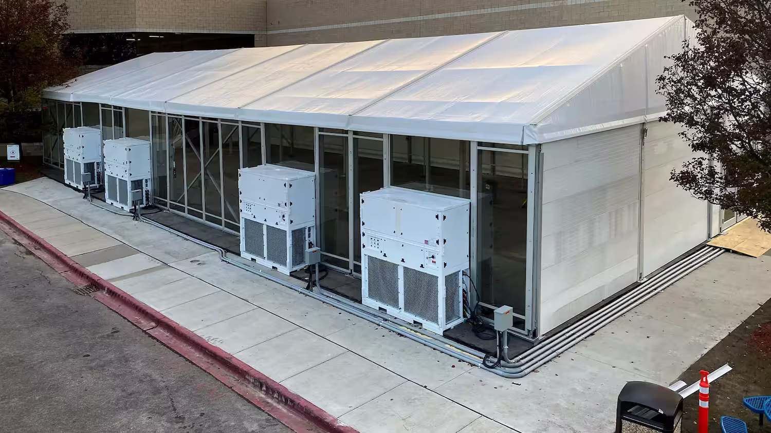Industrial tent with several air conditioners connected