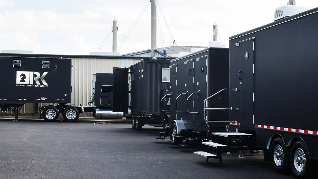 National Structures Mobile Assets Trailers set up on blacktop