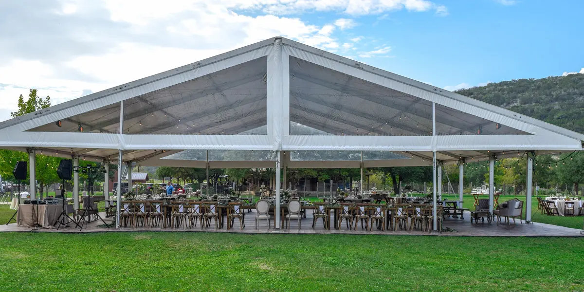 Structure tent with clear walls decorated for a wedding
